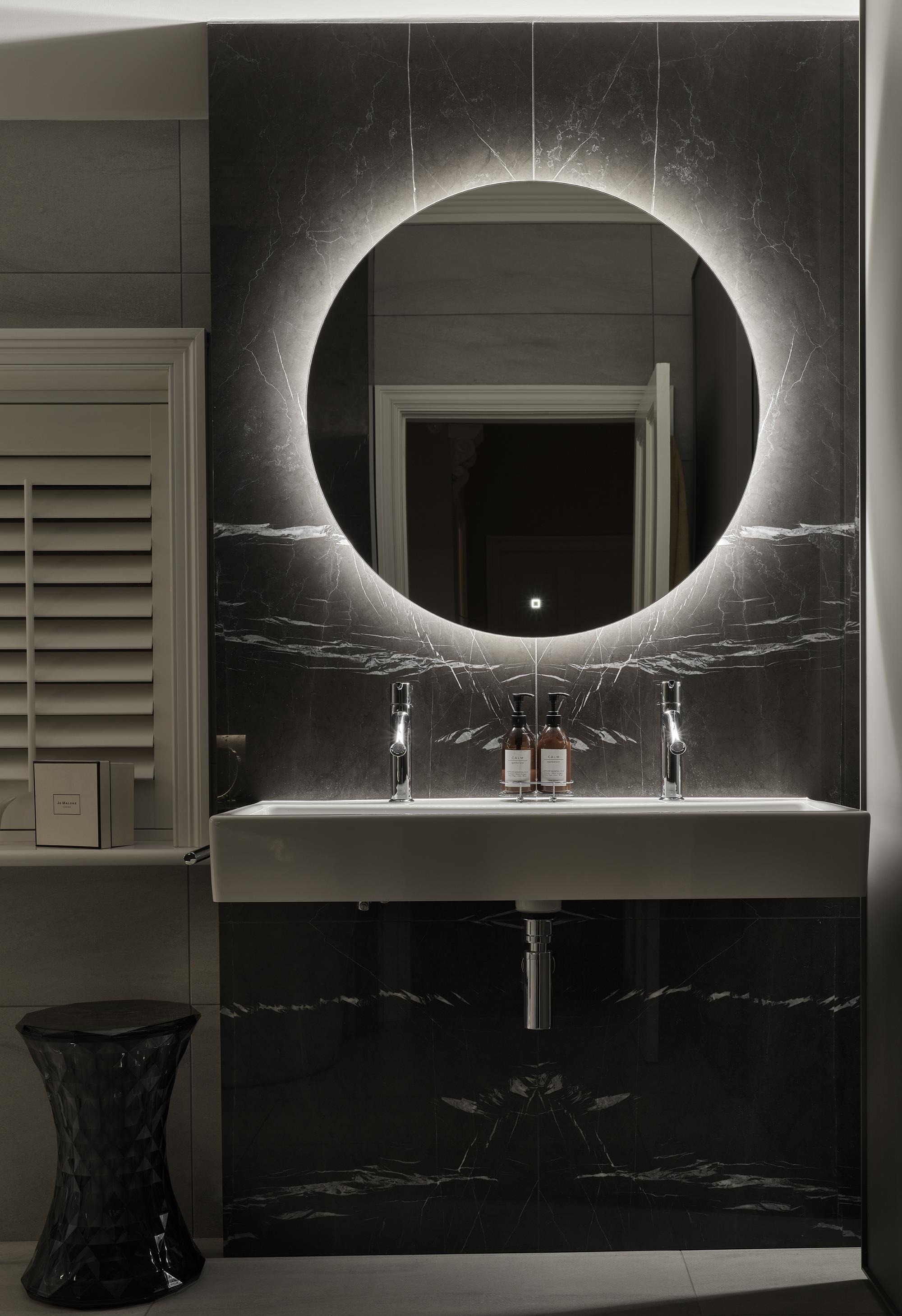 Dark bathroom with mirror