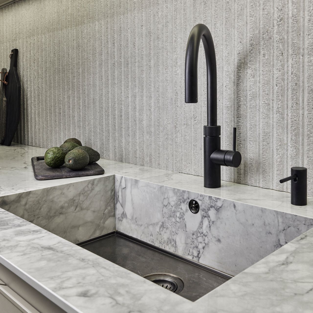 White sink and black tap