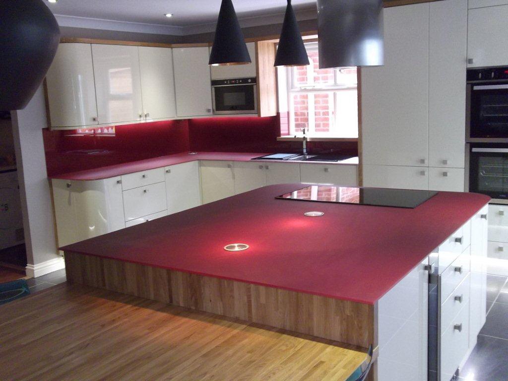 White kitchen with red worktops